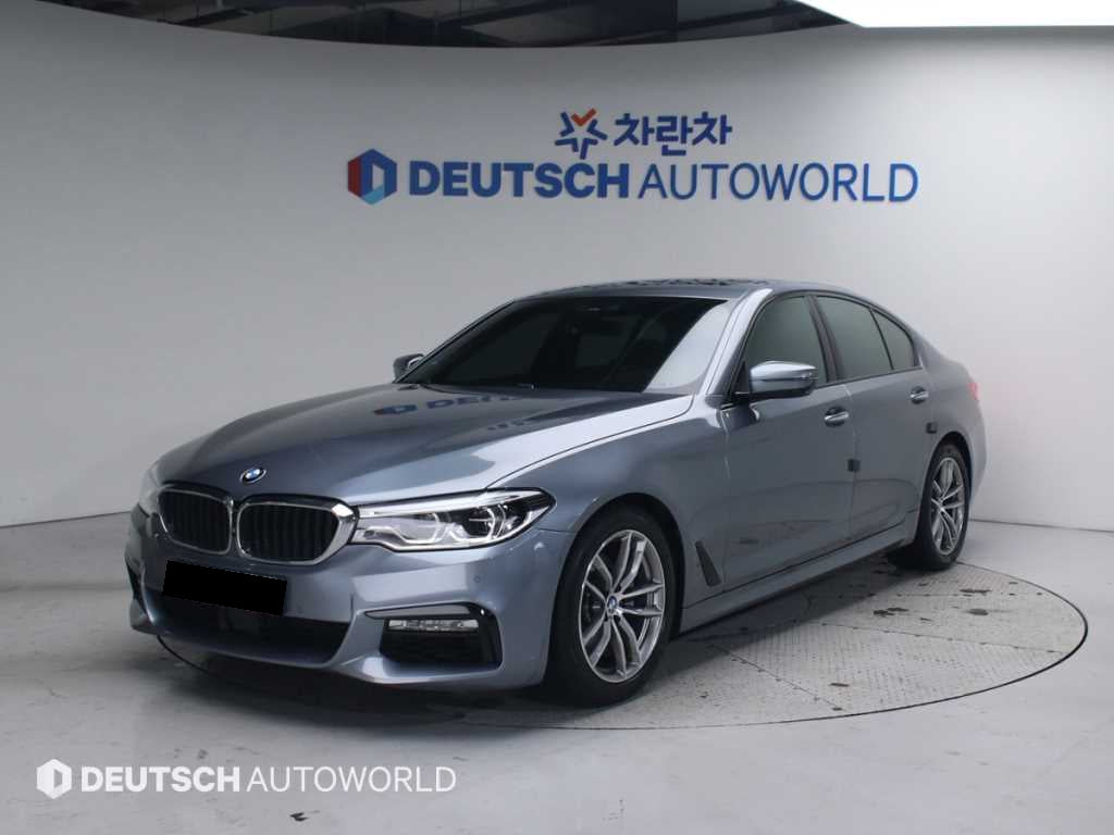 BMW 5-Series — photo 01
