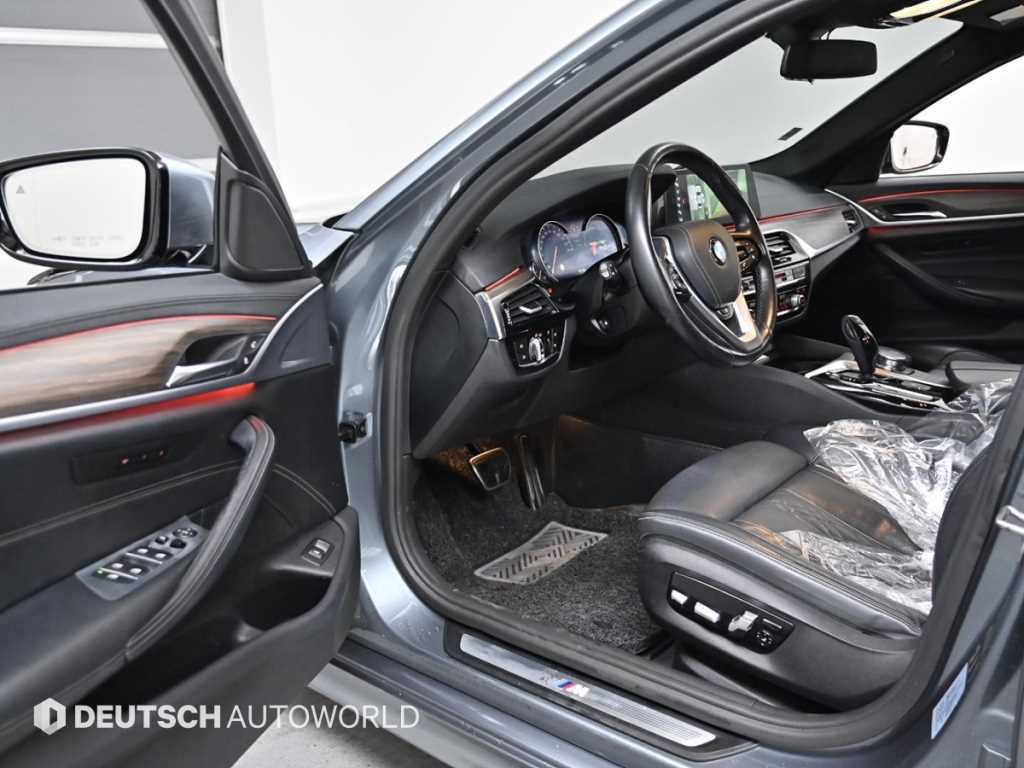 BMW 5-Series — photo 11