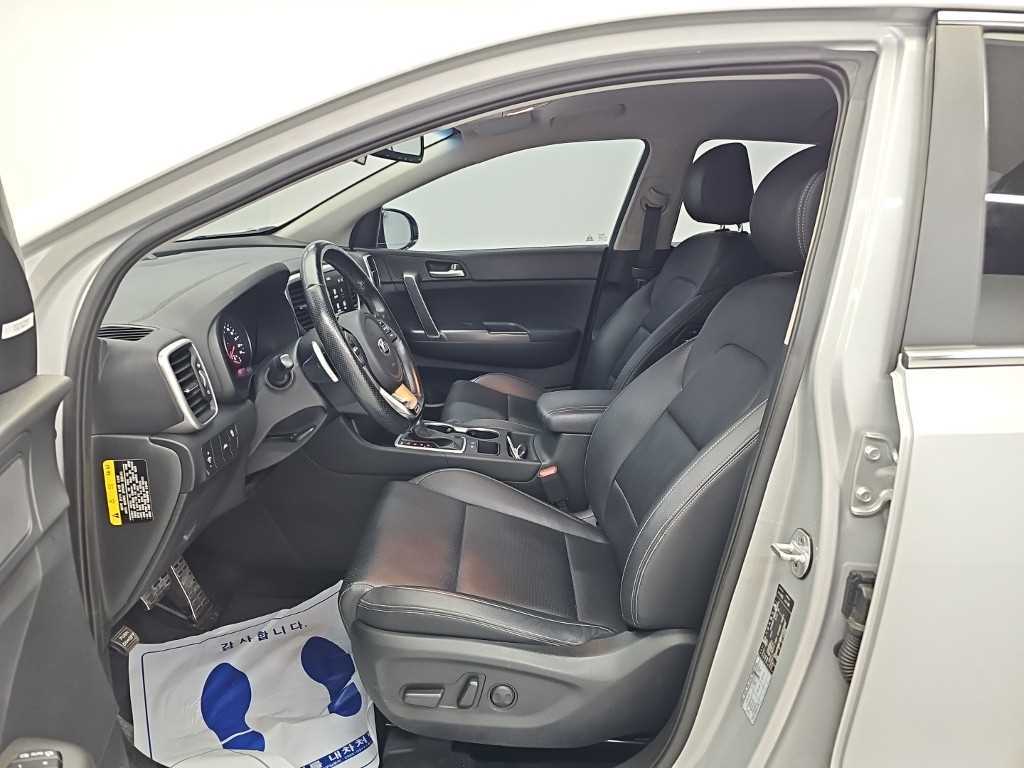 Kia Sportage — photo 11