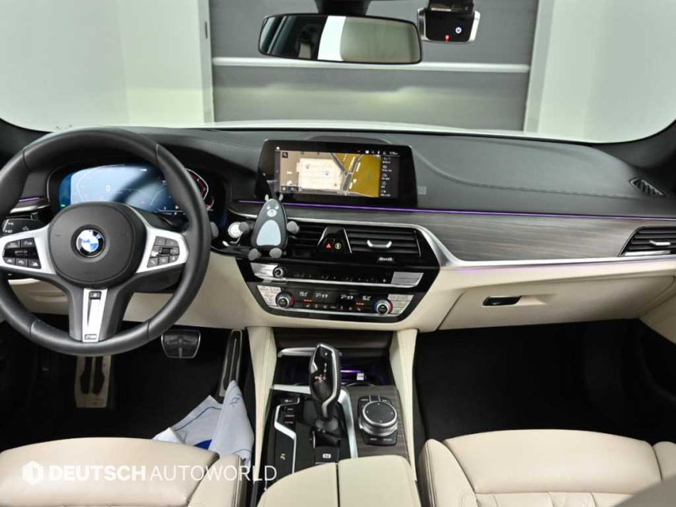 BMW 5-Series — photo 01