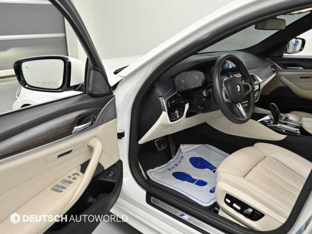 BMW 5-Series — photo 11