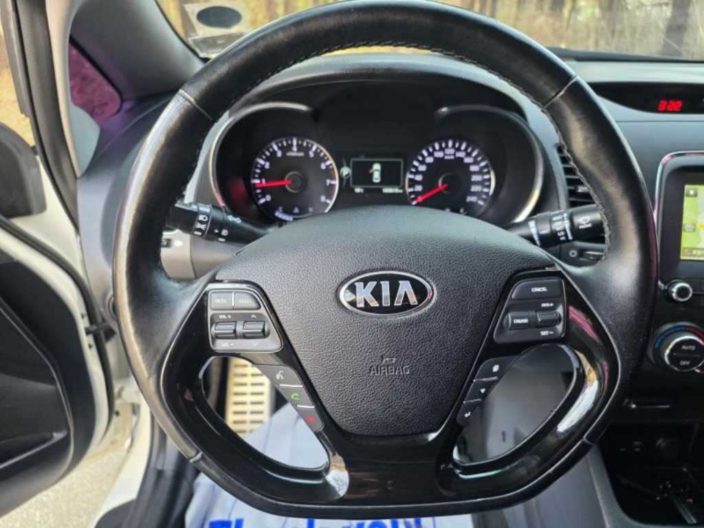 Kia K3 — photo 04
