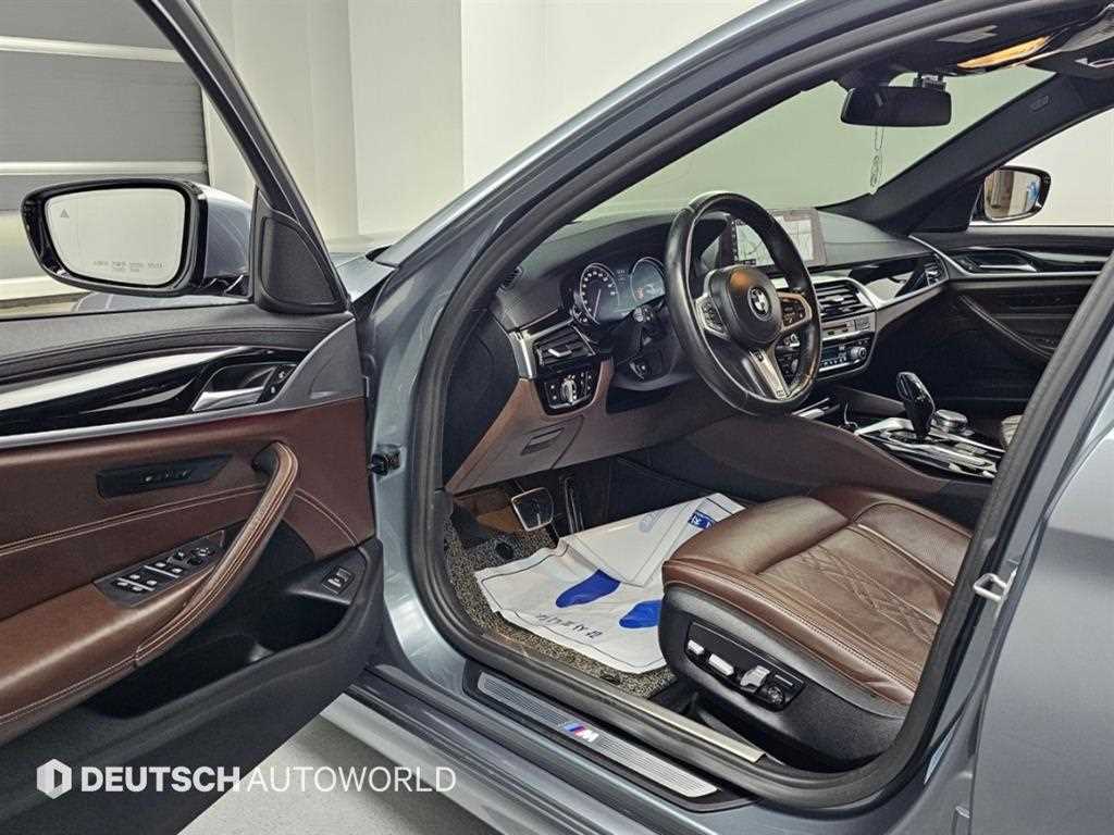 BMW 5-Series — photo 11