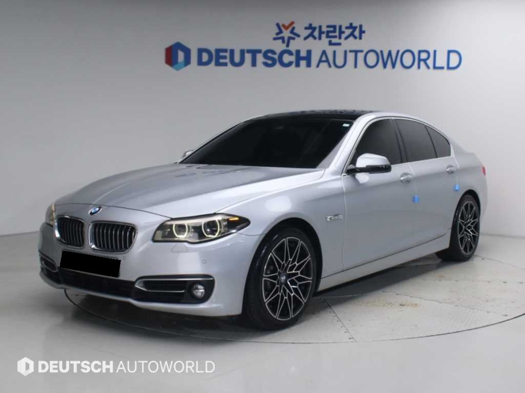 BMW 5-Series — photo 01