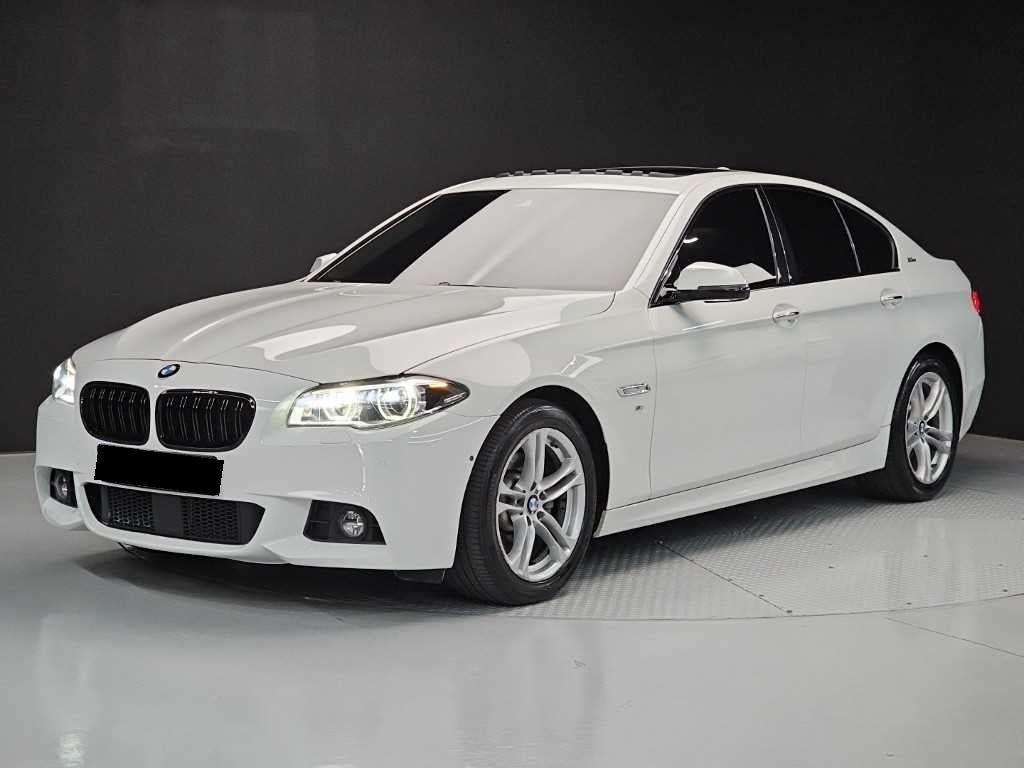 BMW 5-Series — photo 01