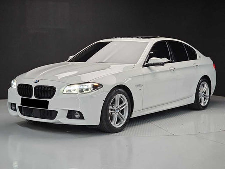 BMW 5-Series — photo 01