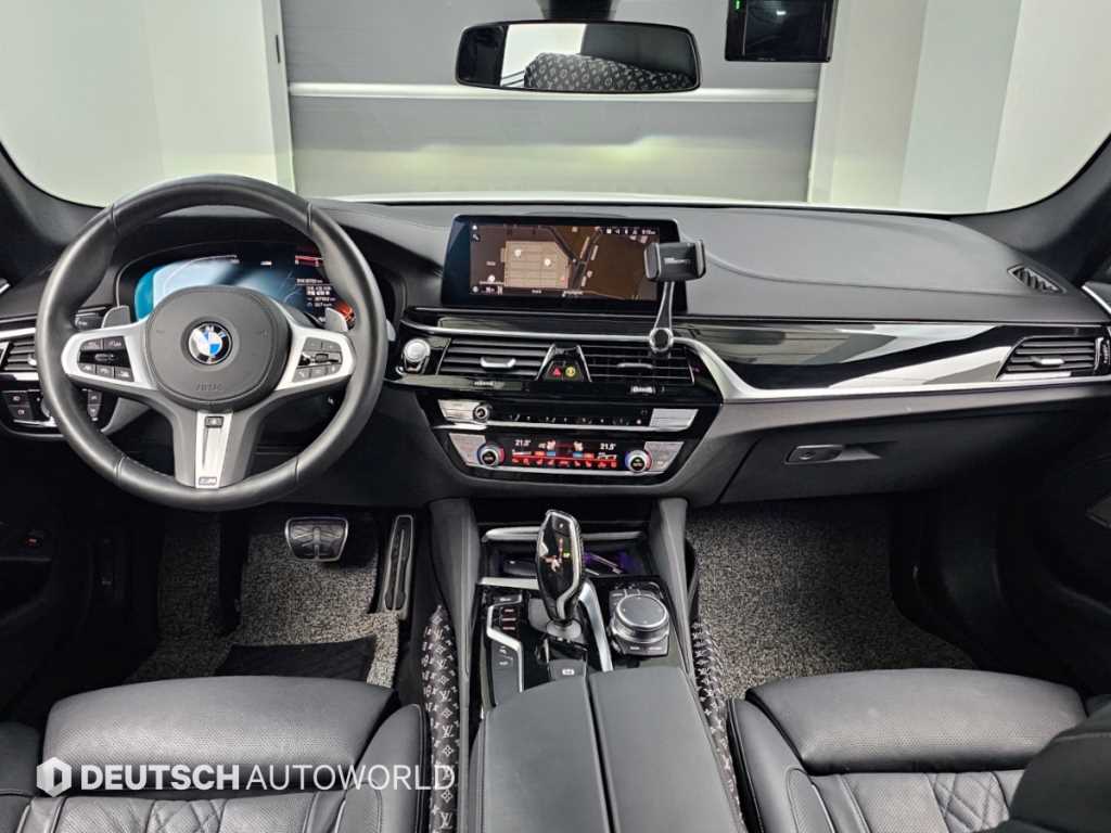 BMW 5-Series — photo 07