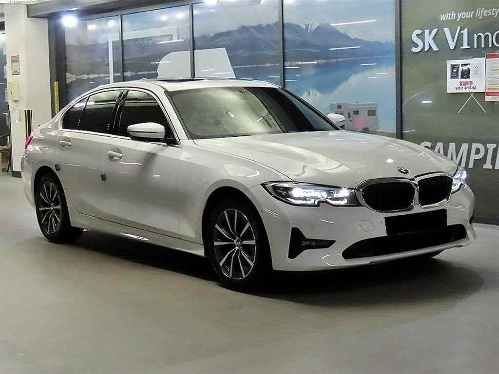 BMW 3-Series — photo 01