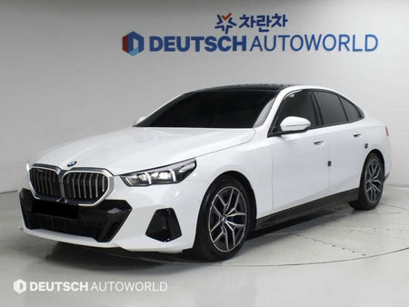 BMW 5-Series — photo 01