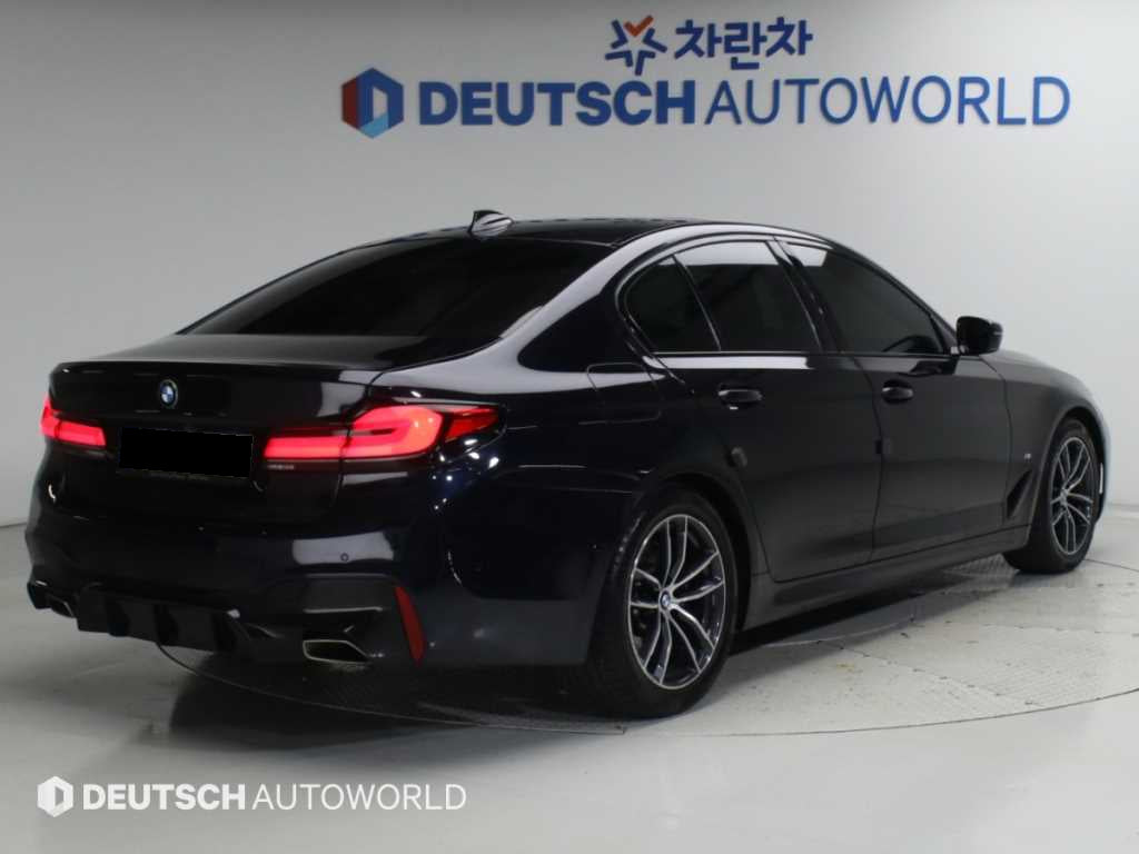 BMW 5-Series — photo 02