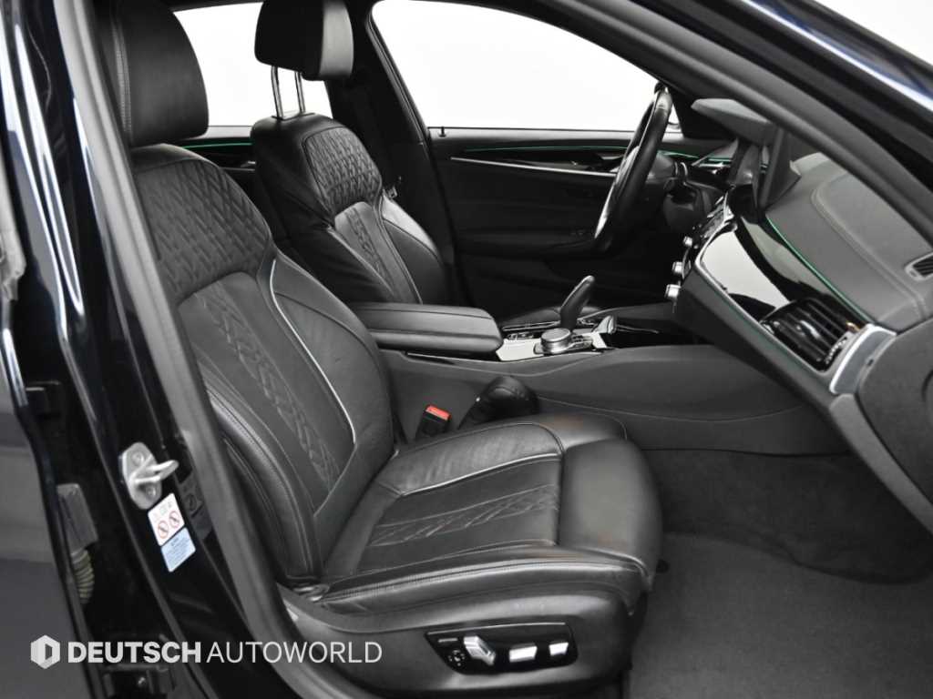 BMW 5-Series — photo 10