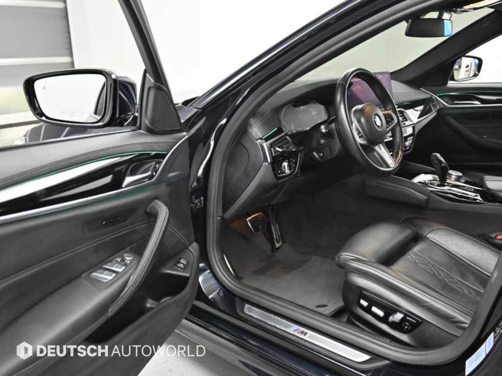 BMW 5-Series — photo 11