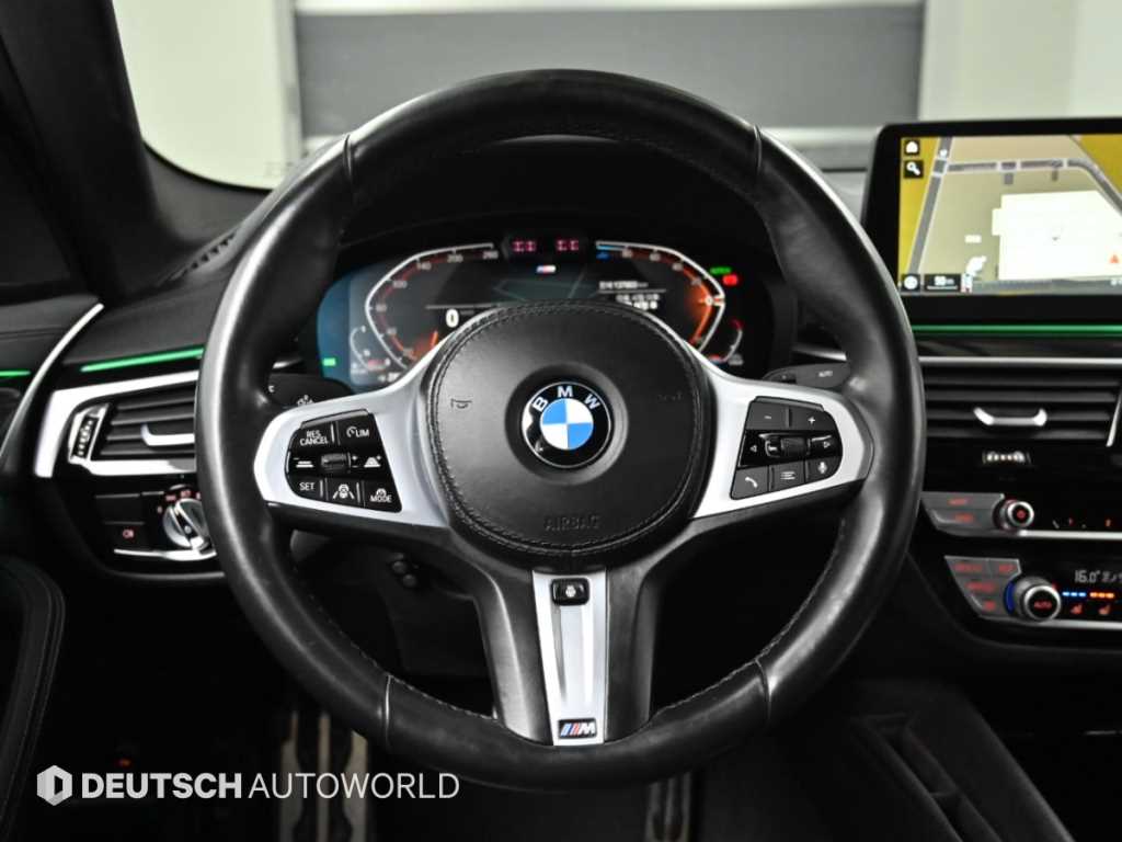 BMW 5-Series — photo 13