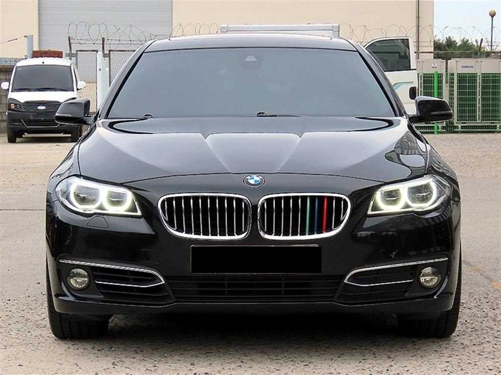 BMW 5-Series — photo 01