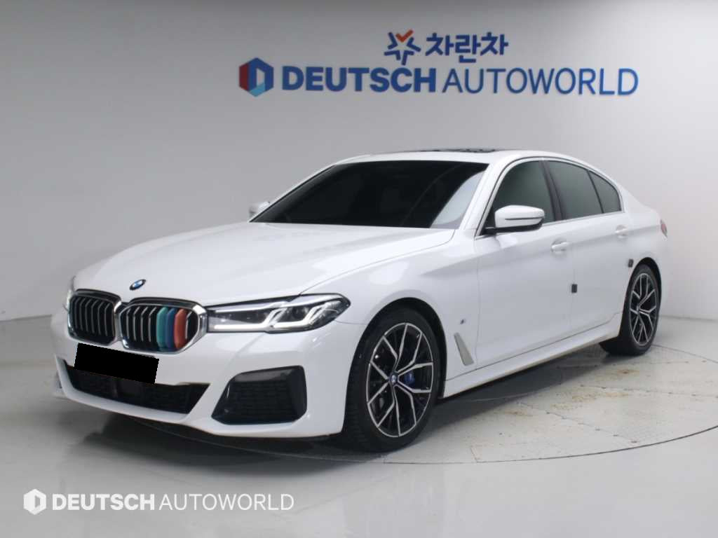 BMW 5-Series — photo 01