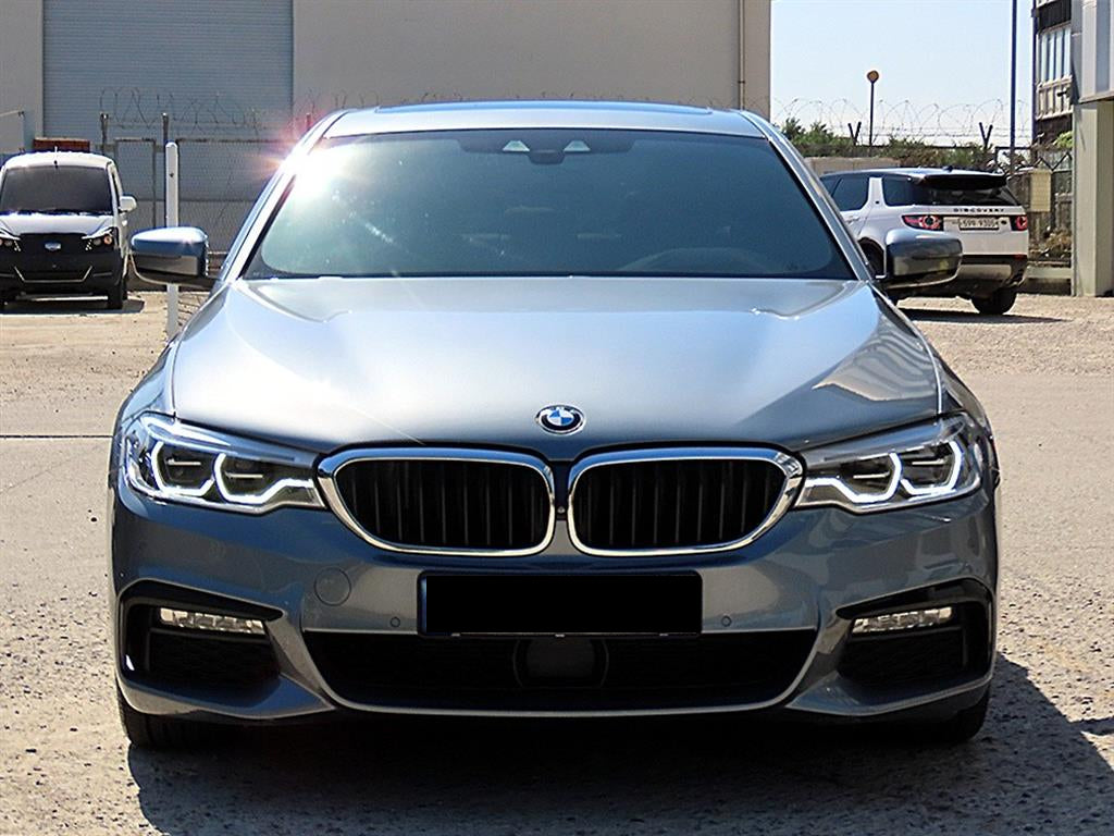BMW 5-Series — photo 01