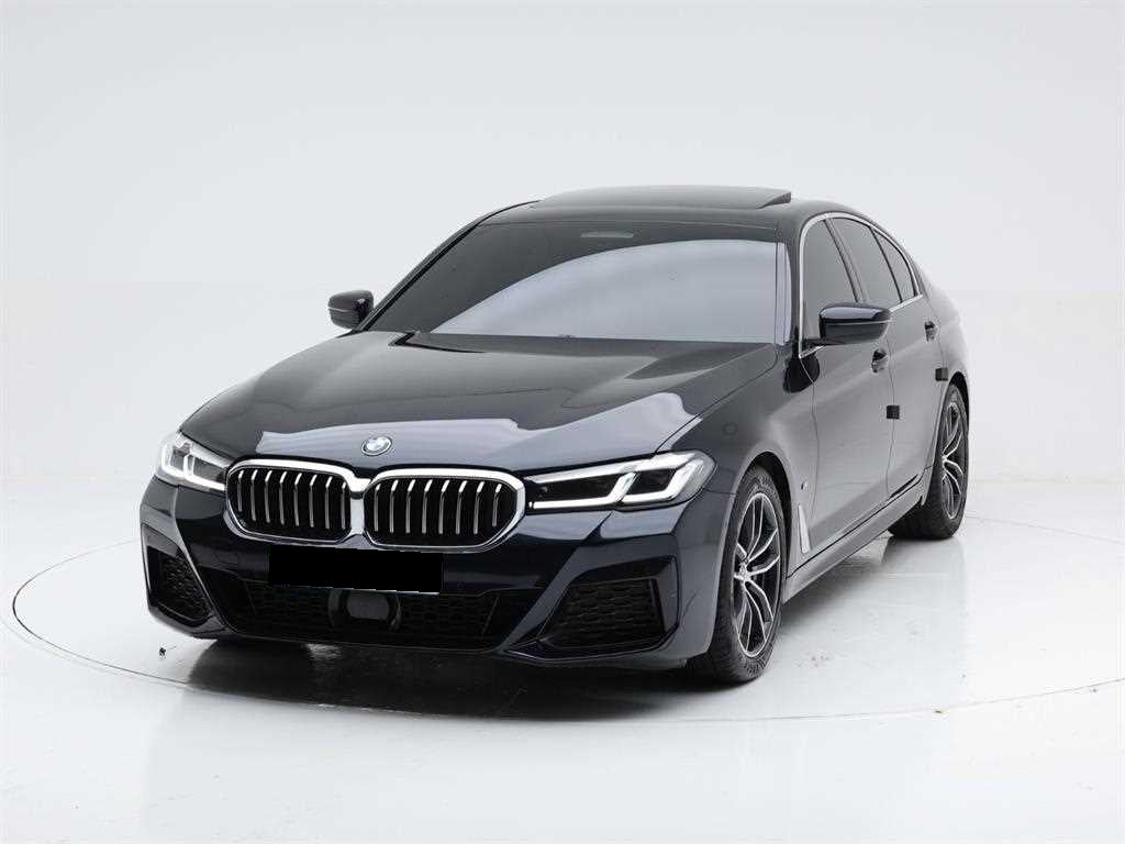 BMW 5-Series — photo 01