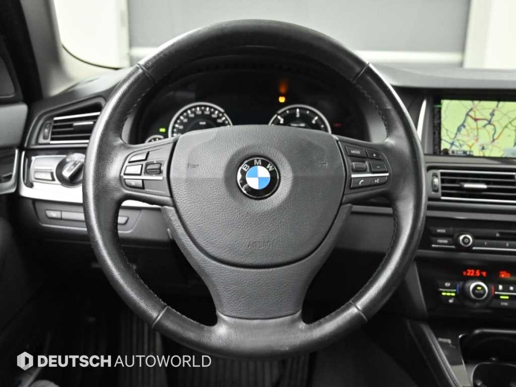 BMW 5-Series — photo 13