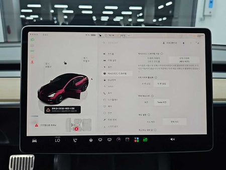 Tesla Model 3 — photo 17