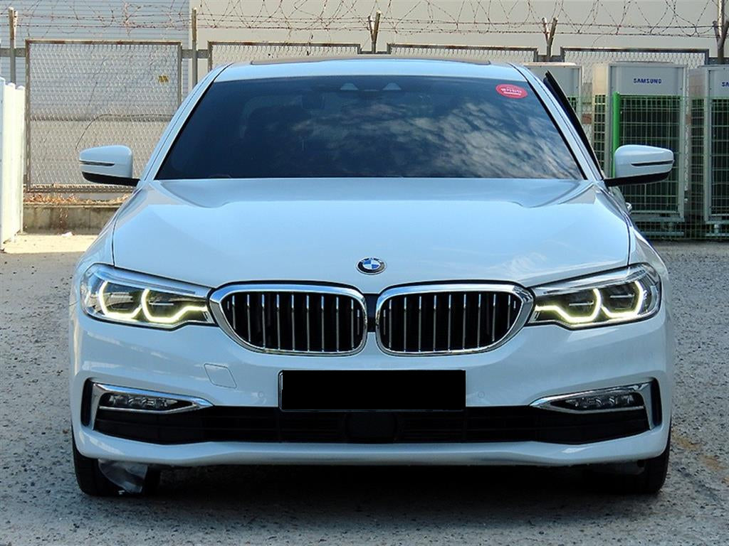 BMW 5-Series — photo 01