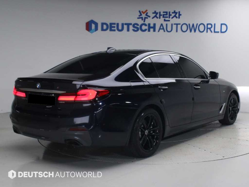 BMW 5-Series — photo 02