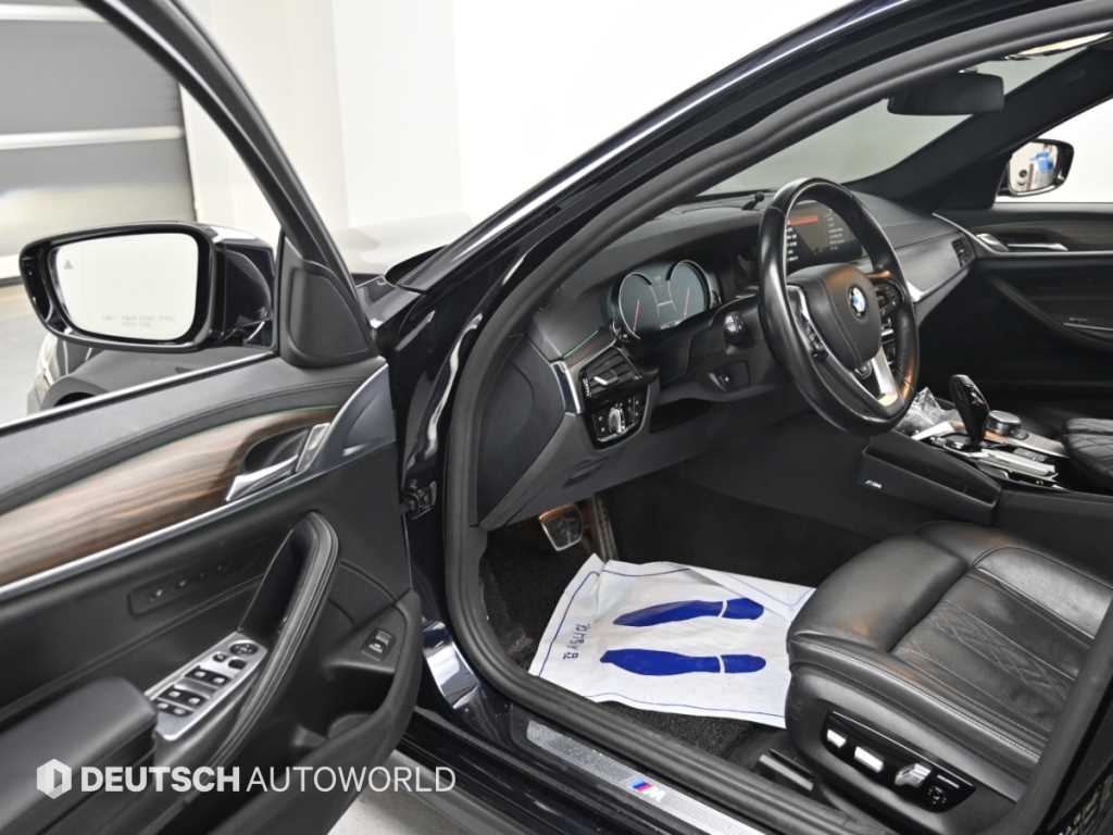 BMW 5-Series — photo 11