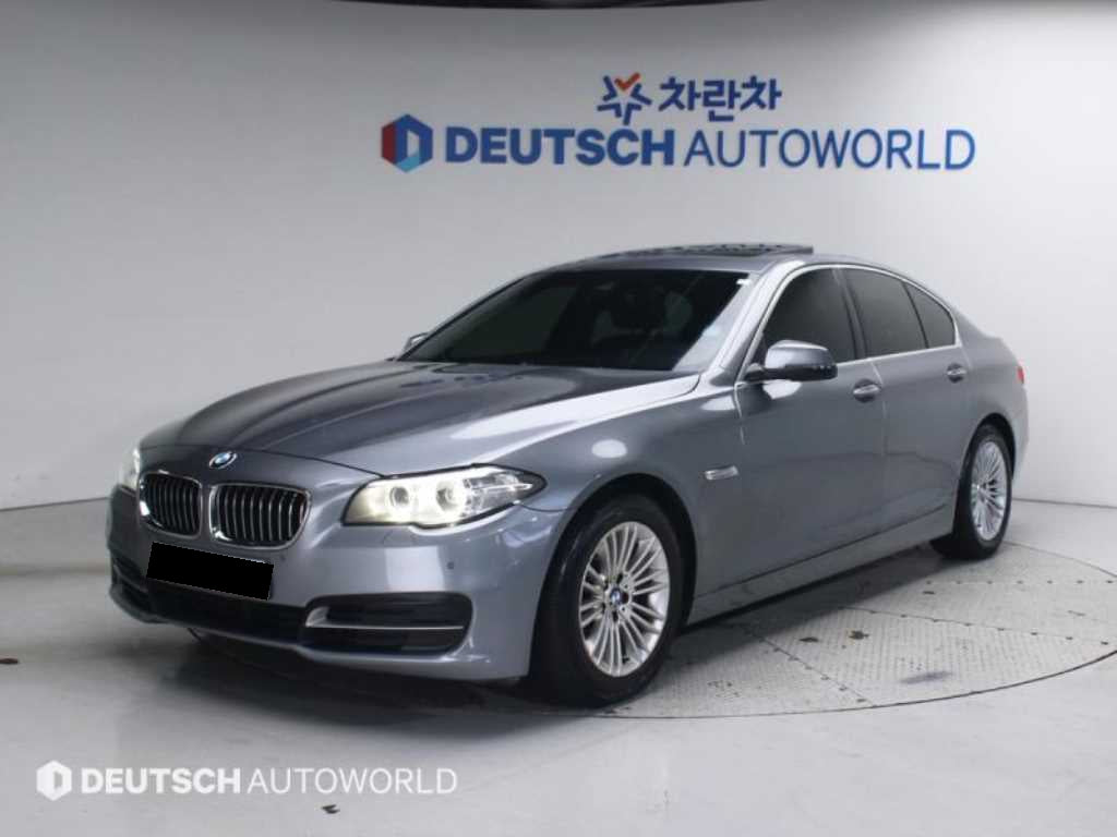 BMW 5-Series — photo 01