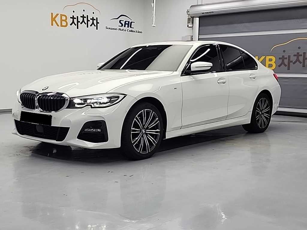 BMW 3-Series — photo 01