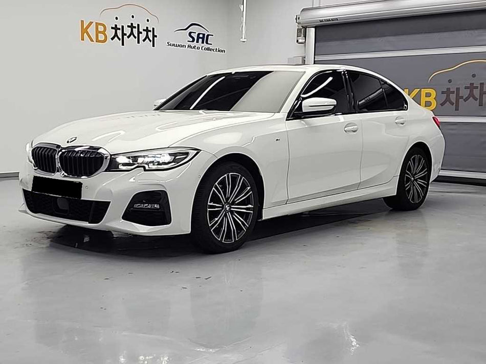 BMW 3-Series — photo 01