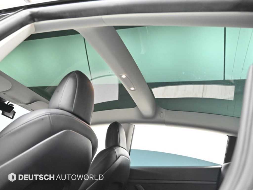 Tesla Model 3 — photo 18