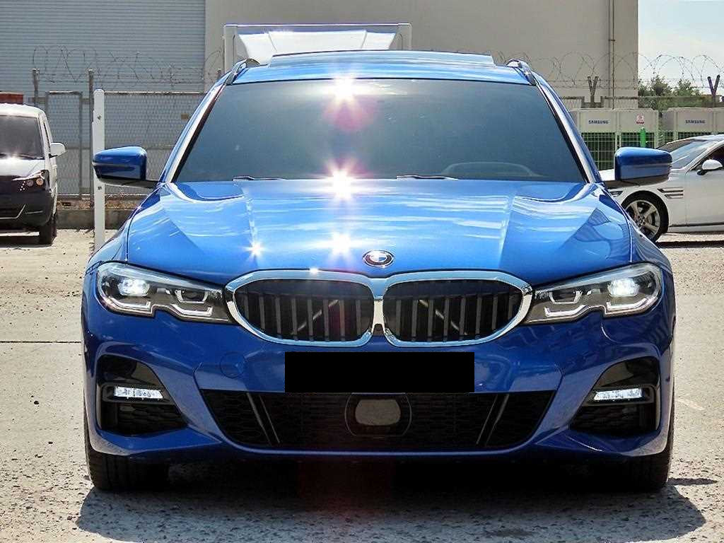 BMW 3-Series — photo 01