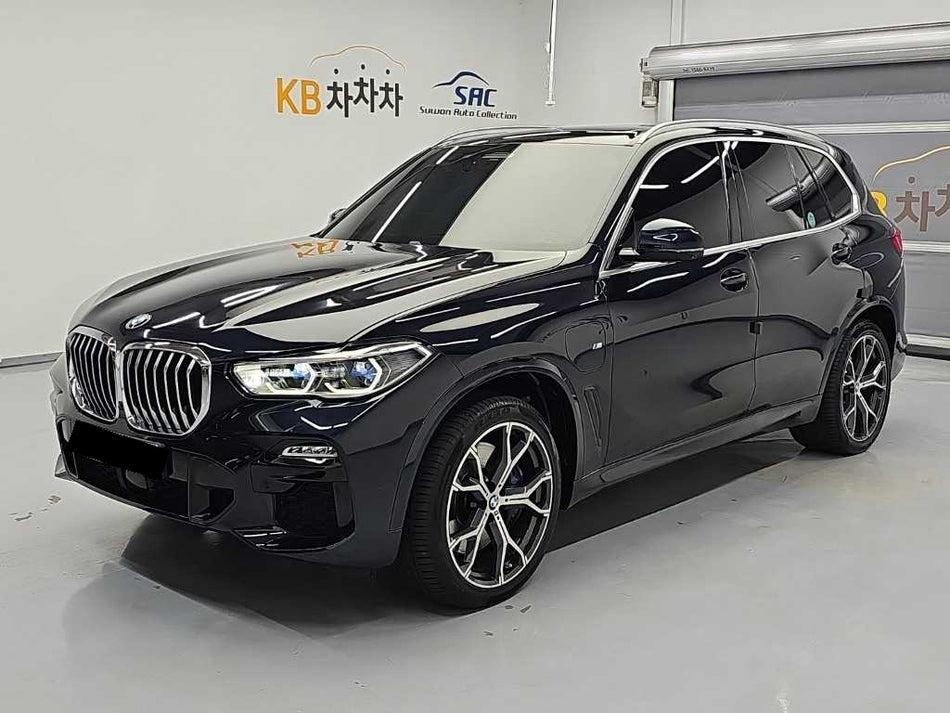 BMW X5 — photo 01
