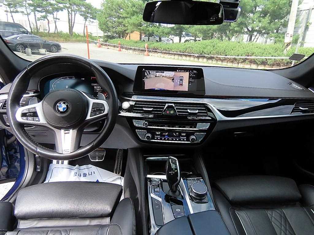 BMW 5-Series — photo 07