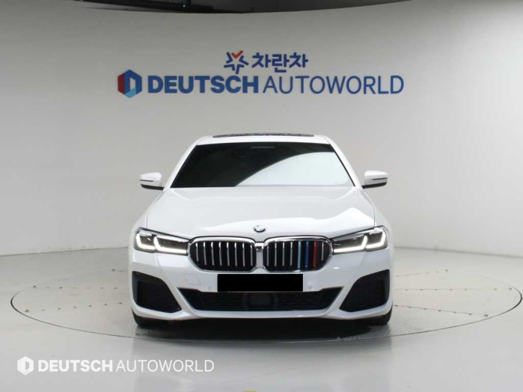 BMW 5-Series — photo 01