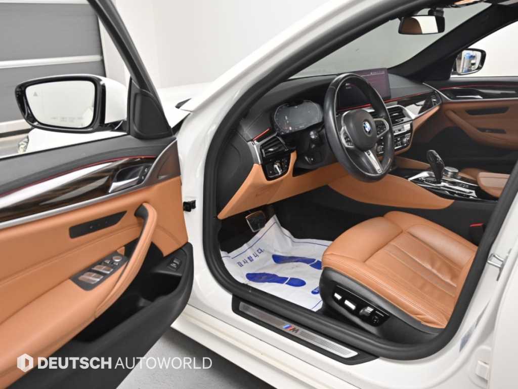 BMW 5-Series — photo 11