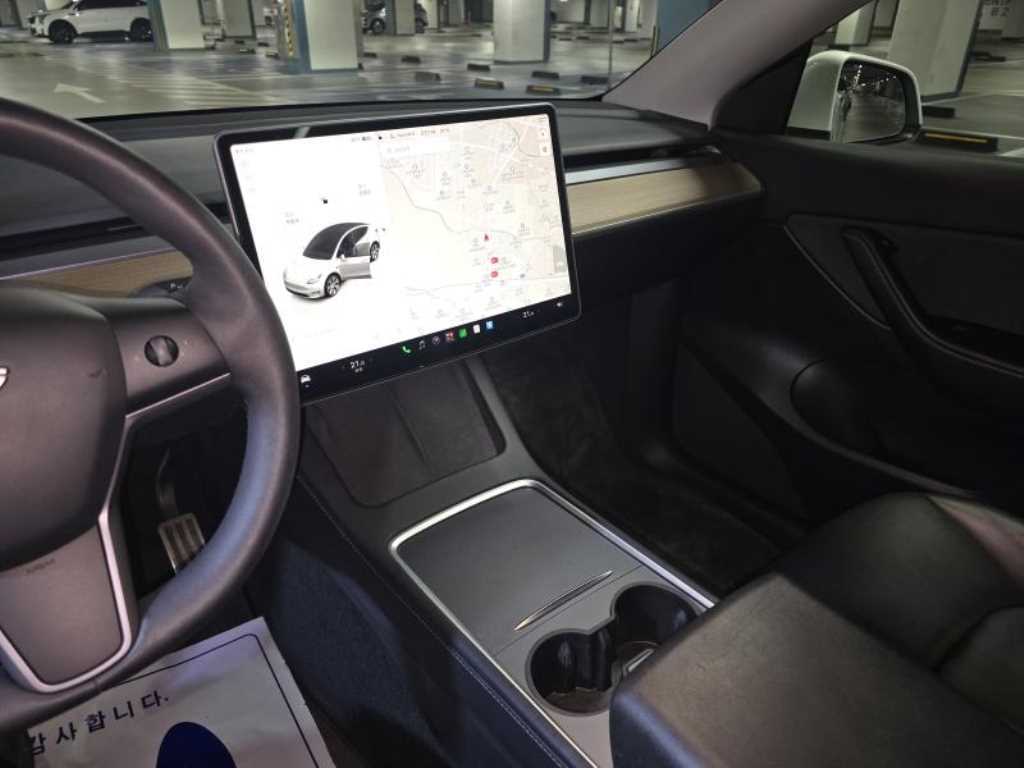 Tesla Model Y — photo 16