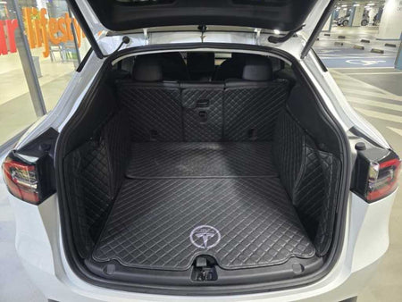 Tesla Model Y — photo 17