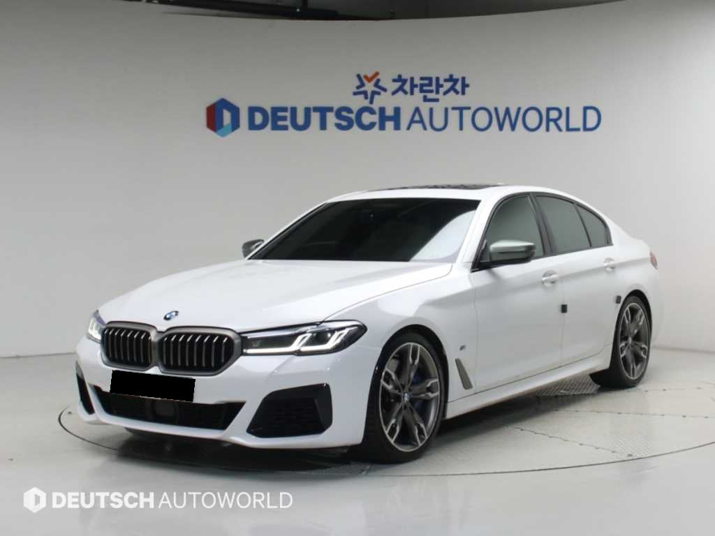 BMW 5-Series — photo 01