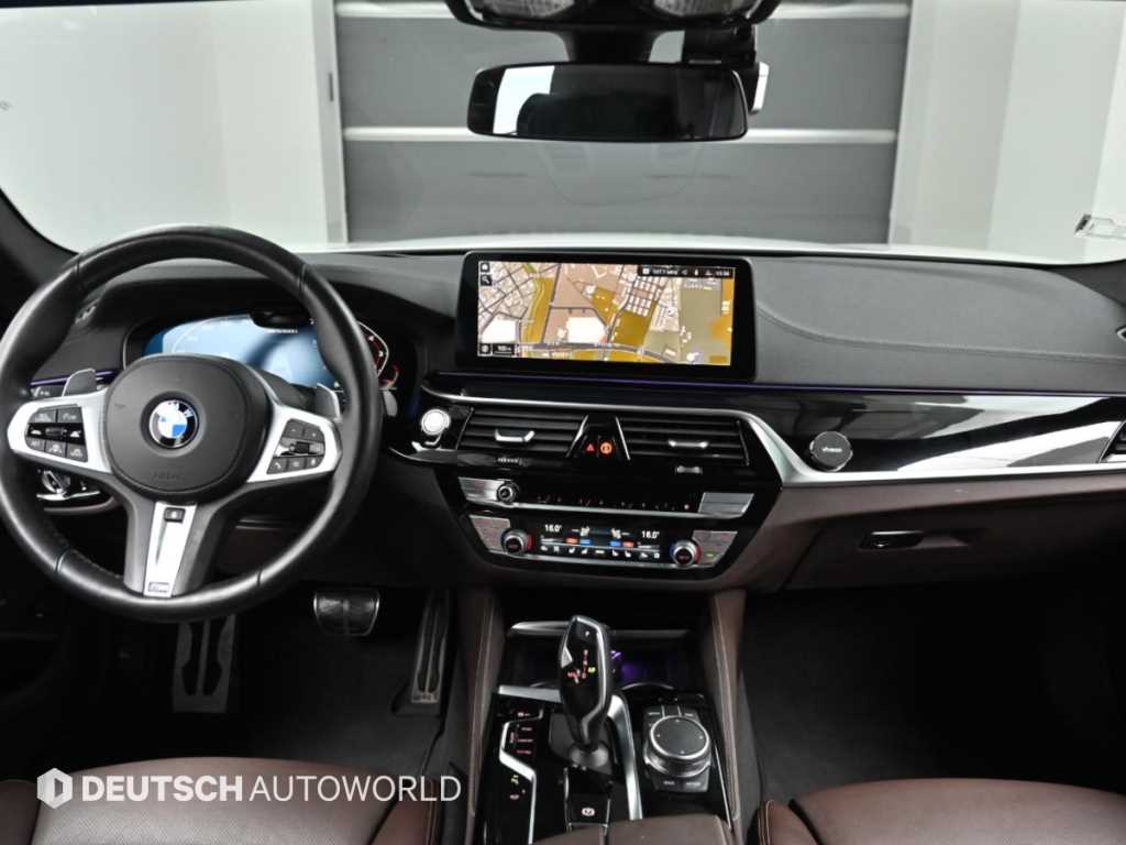 BMW 5-Series — photo 07