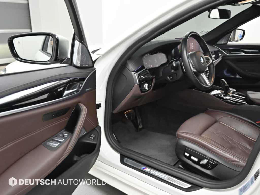 BMW 5-Series — photo 11