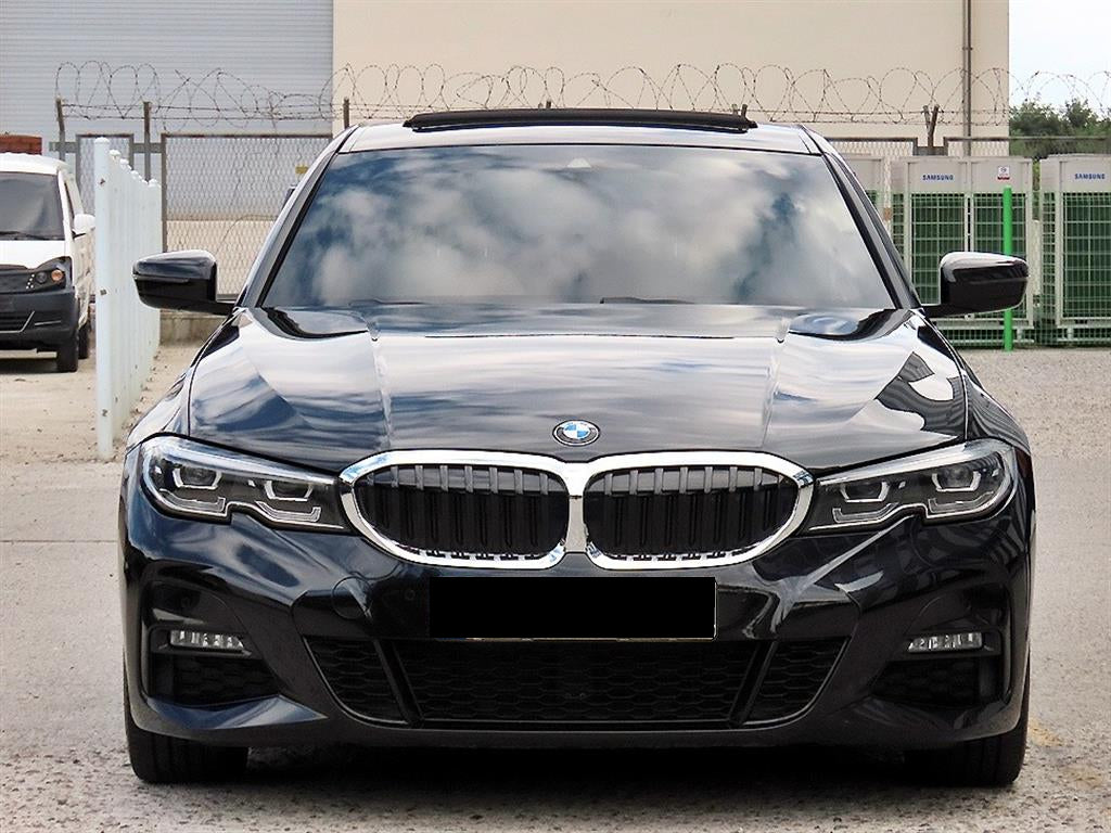 BMW 3-Series — photo 01