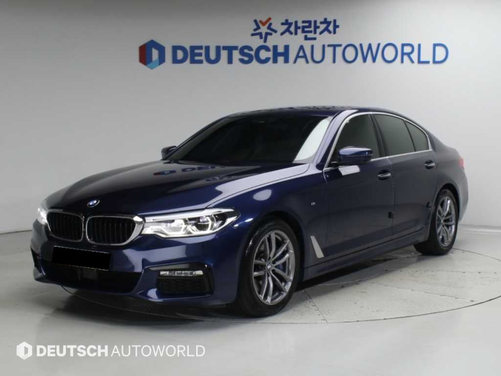BMW 5-Series — photo 01