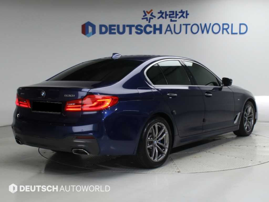 BMW 5-Series — photo 02