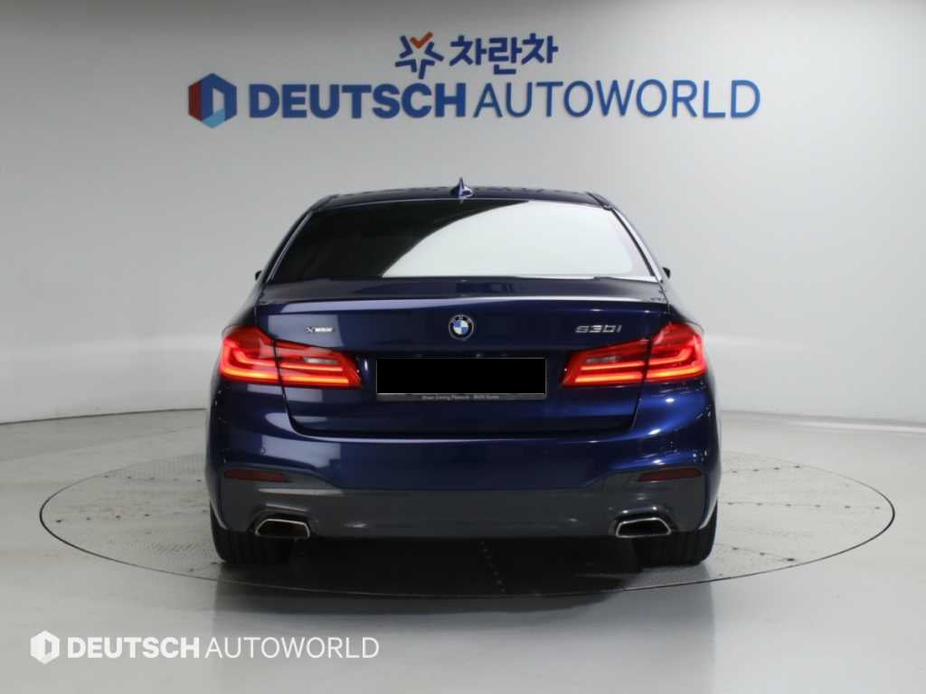 BMW 5-Series — photo 04
