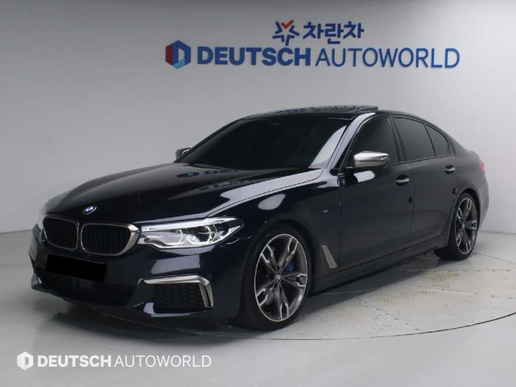BMW 5-Series — photo 01