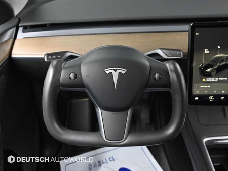 Tesla Model Y — photo 13