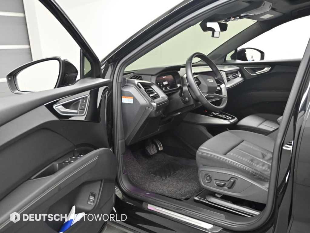 Audi Q4 e-tron — photo 11