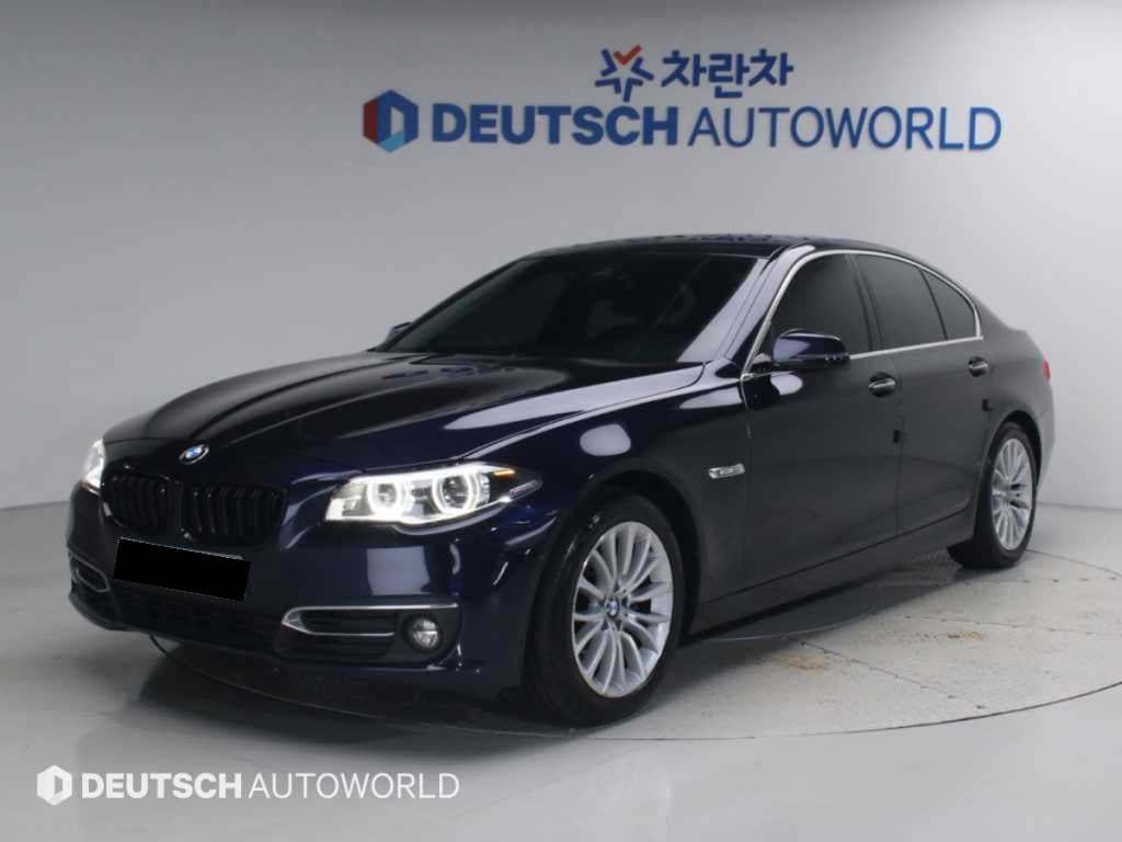 BMW 5-Series — photo 01