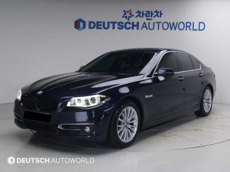 BMW 5-Series — photo 01