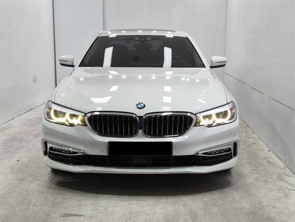 BMW 5-Series — photo 01